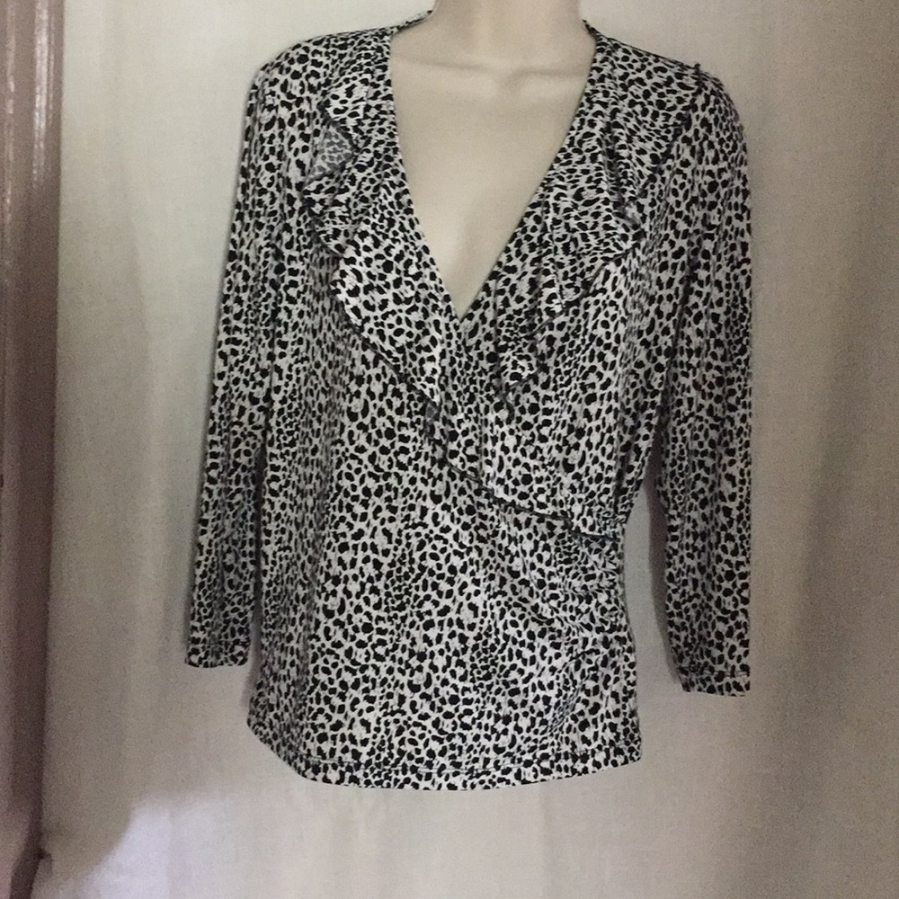 Jones New York collection.  Polyester/Spandex.